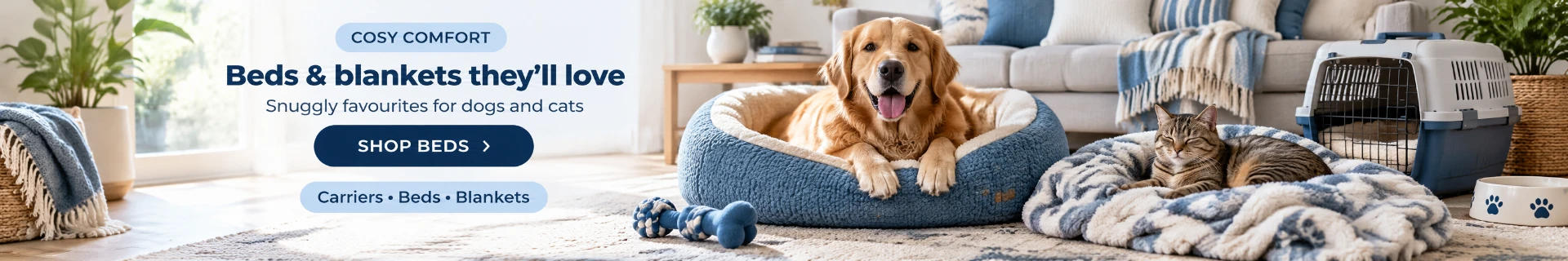 A golden retriever and a cat snuggled into soft pet beds and blankets